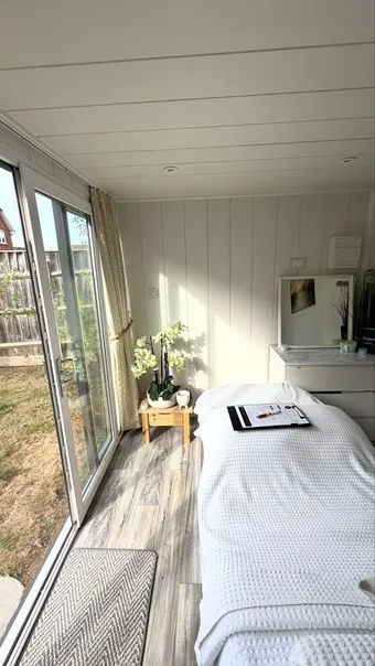The stool by the window.